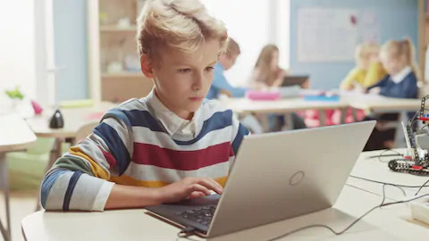 children laptop classroom